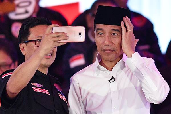 Survei Populi: Kalah di Kalangan Milenial, Jokowi-Ma'ruf Populer di Usia 35 Tahun ke Atas