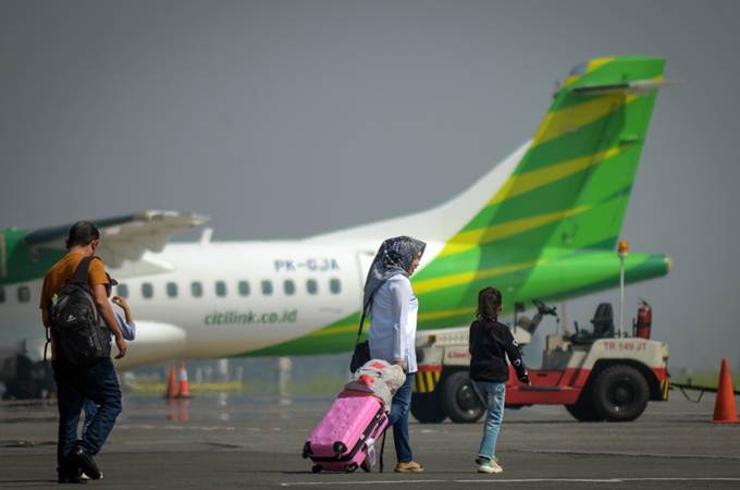 Harga Tiket Pesawat Turun 50% dari Tarif Batas Atas: Ini Perinciannya