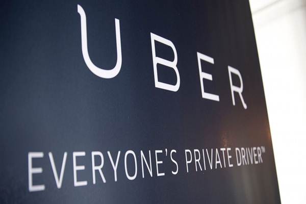 Uber Berhentikan Ratusan Karyawan