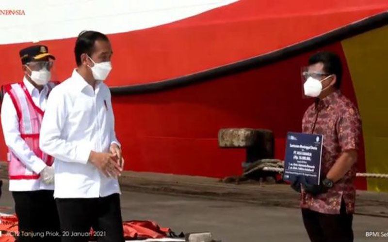 Saksikan Penyerahan Santunan Rp1,25 M pada Korban Sriwijaya Air, Ini Pesan Jokowi