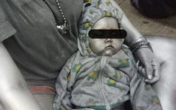 Viral Medsos: Bayi 10 Bulan Dicat Warna Silver Diajak Cari Uang