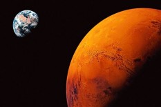 Ilmuwan Temukan Air Es di Mars