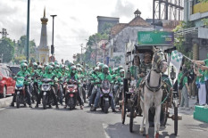 Program Solidaritas Bikin 91,7% Mitra Pengemudi Grab Betah dan Setia