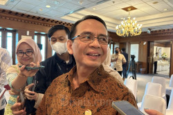 OJK Sebut Eks Bos Investree Adrian Gunadi Jadi Tersangka dan Masuk DPO