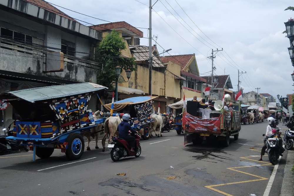 Korban Kasus  Malioboro City Desak Pemda DIY Segera Bertindak, Puluhan Gerobak Sapi Diarak