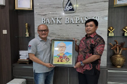 Dirut Bank Bapas 69 Simpan Kain Kafan di Ruang Kerja, Ada Pesan Mendalam di Baliknya