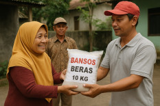 Polisi Awasi Distribusi Bantuan Pangan Beras 10 Kg dan SPHP