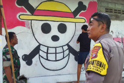 Mural One Piece di Triharjo SLeman Dihapus, Diawasi TNI dan Polri