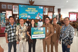 Indomaret-Tempo Scan Salurkan Bantuan Nutrisi Anak di 20 Kota