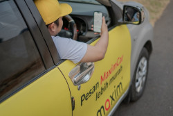 Respons Maxim Soal Cekcok Driver dan Mahasiswi di Sleman